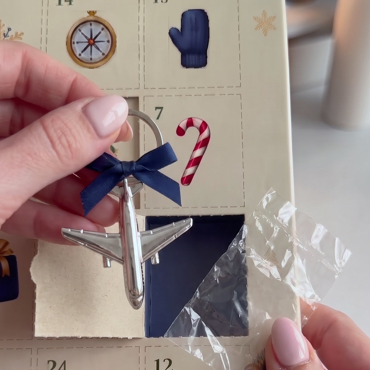 Porte-clés avion sorti du calendrier Hublot Avent